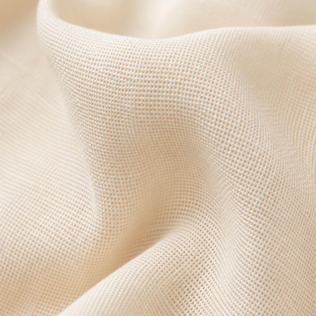 Bright ivory cotton fabric with clearly visible warp and weft threads